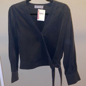 NWT Black blouse with cross bottom and ties